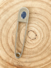 Load image into Gallery viewer, A sodalite stone set on a metallic silver color and a stainless steel jumbo safety pin used as a keychain.